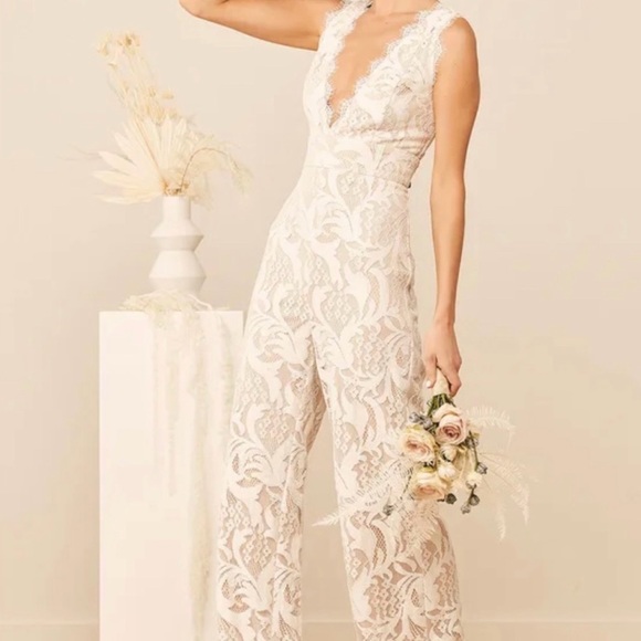 I have 2 jumpsuits! one in a sz LG and one in a XL! - Picture 4 of 4